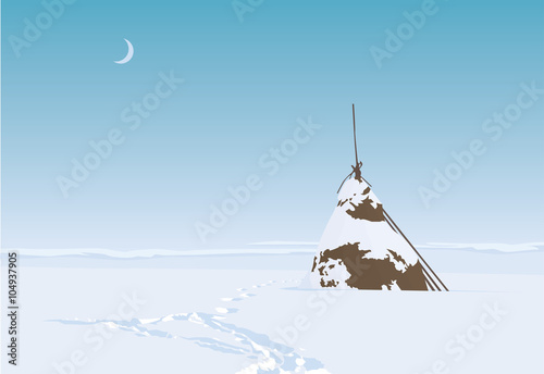 Lonesome haystack on a field in snowy winter