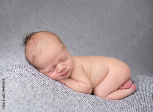 Newborn Baby Sleeping on Blanket