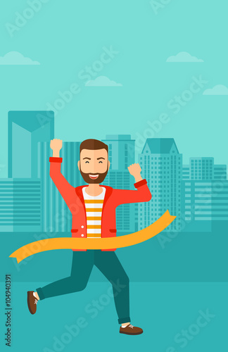 Businessman crossing finish line.