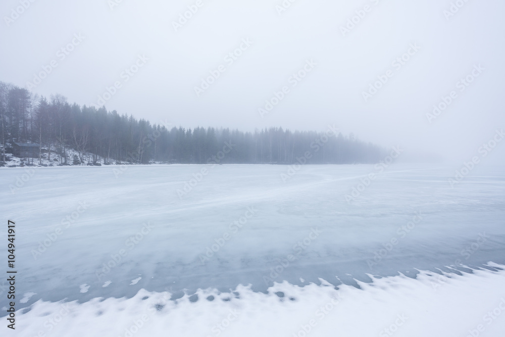 Thick fog at frozen lake landscape Thick fog at frozen lake landscape