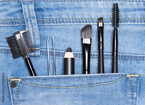 Accessories for care of the eyebrows in jeans pocket photo