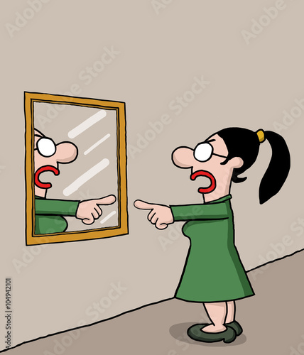 Woman is talking to himself on the mirror with an angry gesture