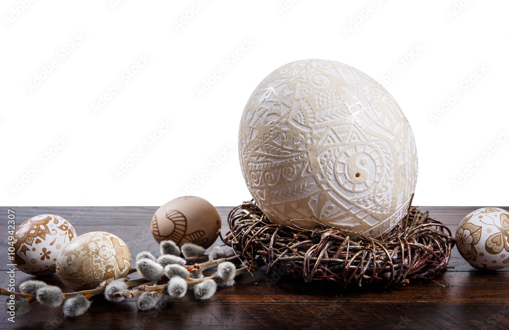 Easter eggs in a nest on a wooden background. Easter Theme. Happy Easter Easter eggs in a nest on a wooden background. Easter Theme. Happy Easter