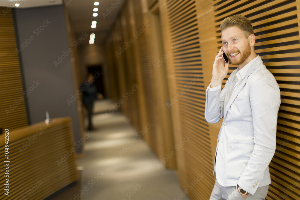 Fototapeta premium Young man in the office