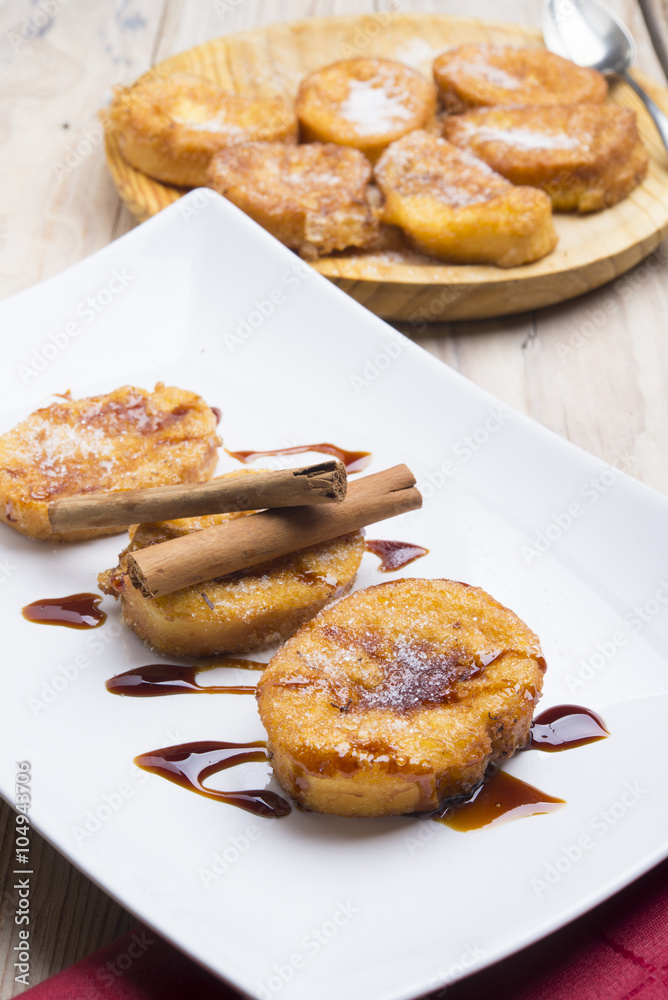 plate with torrijas, typical spanish plate with torrijas, typical spanish