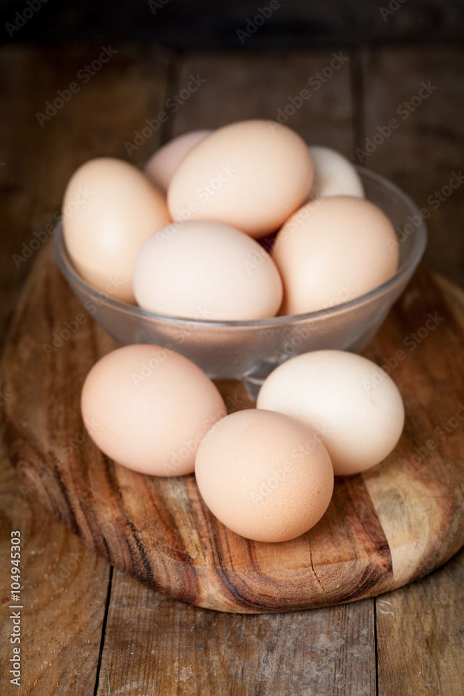 Chicken fresh brown eggs on wooden rustic table Chicken fresh brown eggs on wooden rustic table