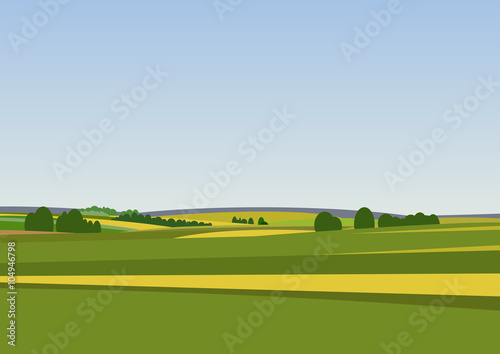 Green landscape with yellow fields.