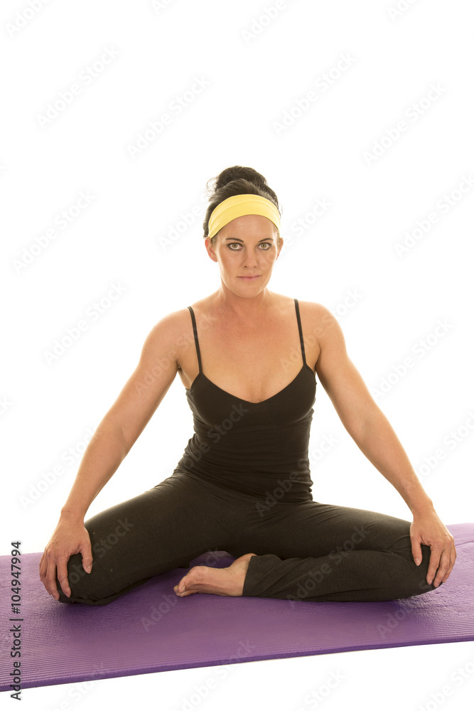 fitness woman in strap tank sit hands on knees fitness woman in strap tank sit hands on knees
