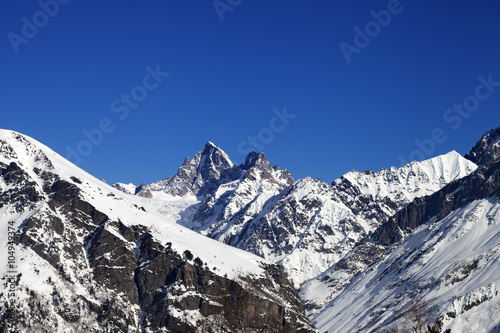Mountain peaks in winter at sunny day © BSANI