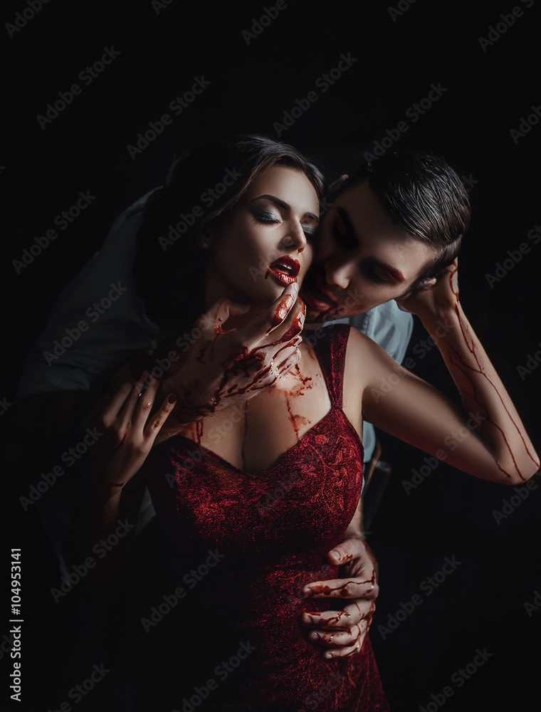 para mi Monumental Política Sexy girl vampire in passionate embrace man's hands, dripping drop blood,  man hugging woman. red dress. Two people, couple in love. Gothic bloody  passion. Glamour classic halloween image Stock Photo | Adobe