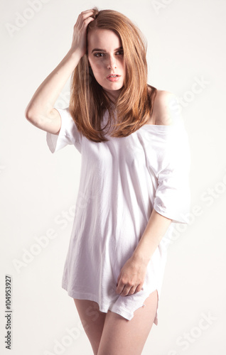 Woman Wearing Only Tee Shirt Stock Photo | Adobe Stock