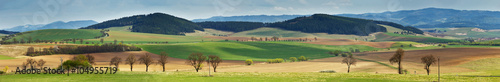 Green spring hills in Slovakia. April sunny countryside panorama
