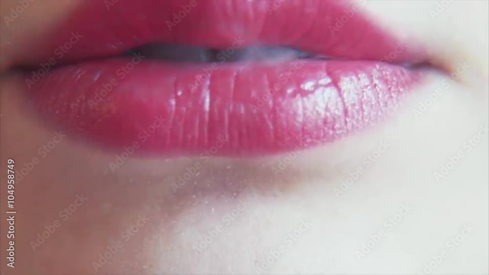 Female Lips Exhale Smoke From a Hookah Female Lips Exhale Smoke From a Hookah