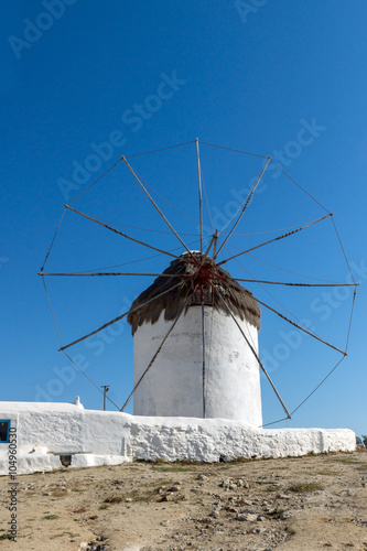 White windmill and blue sky on the island of Mykonos, Cyclades, Greece