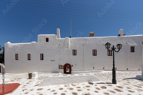 Frontal view of Panagia Tourliani monastery inTown of Ano Mera, island of Mykonos, Cyclades, Greece photo