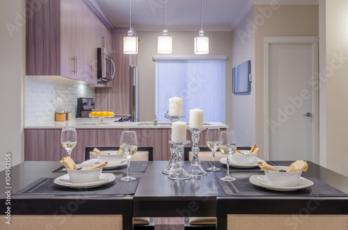 Modern dining room in luxury house. © karamysh
