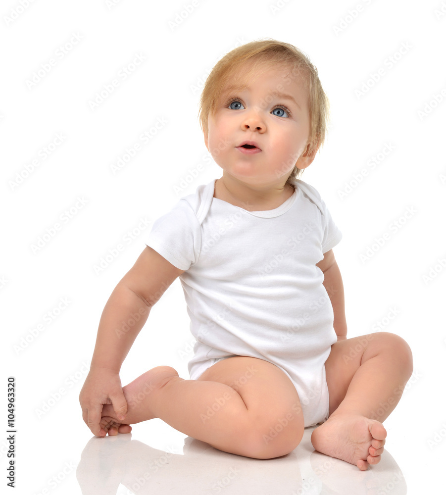 Infant child baby girl toddler sitting in body with text space Infant child baby girl toddler sitting in body with text space
