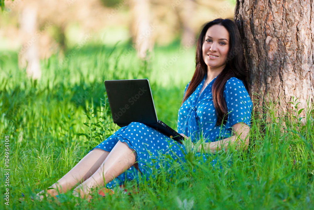 Portrait asian girl on nature with laptop Portrait asian girl on nature with laptop