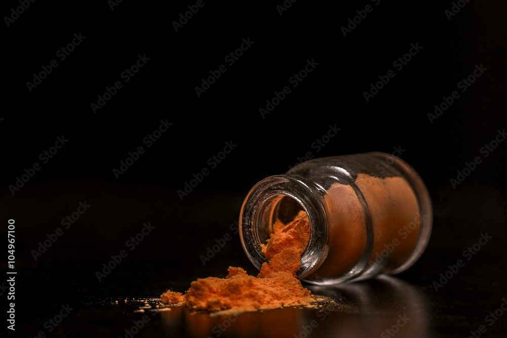 orange colorant powder in the jar - obrazy, fototapety, plakaty 