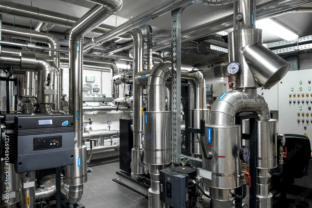 Thermal power plant piping at modern factory Thermal power plant piping at modern factory