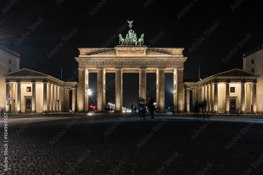 The Brandenburg Gate is an 18th-century neoclassical triumphal arch in Berlin, Germany. Night illumination. The Brandenburg Gate is an 18th-century neoclassical triumphal arch in Berlin, Germany. Night illumination.
