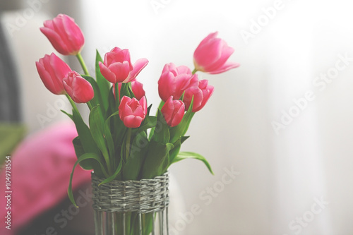 Bouquet of pink tulips in a vase, close up