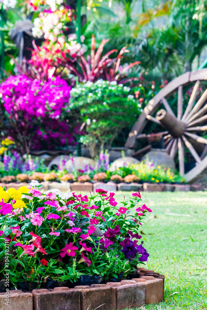 Flowers in the garden. /Landscaped flower garden with lots of colorful blooms. Flowers in the garden. /Landscaped flower garden with lots of colorful blooms.