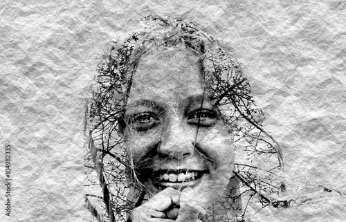 Double exposure of young girl using natural elements