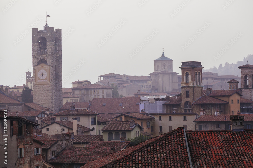 Bergamo bell tower and house roofs