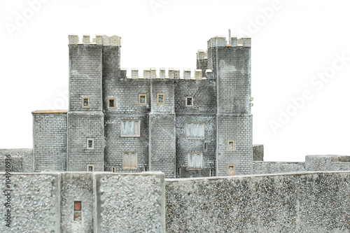 Fotografie Wall of castle showing battlements. isolated on white background