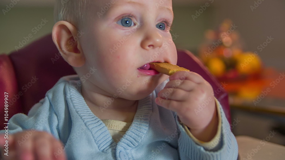 Children with a sweet biscuit