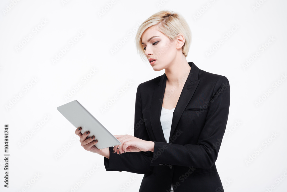 Beautiful businesswoman using tablet computer Beautiful businesswoman using tablet computer