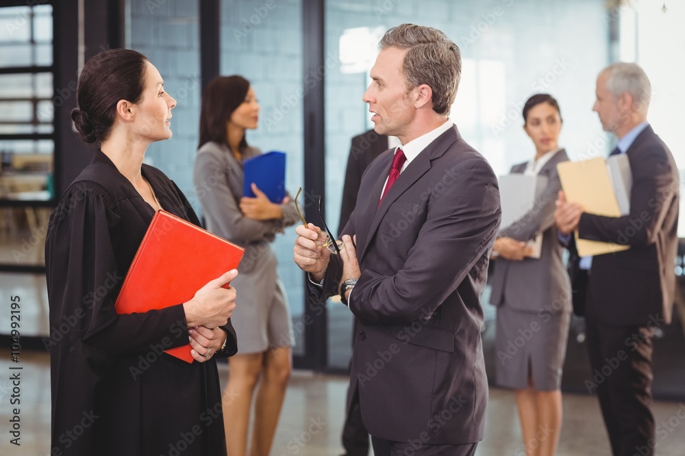 Lawyer interacting with businessman Lawyer interacting with businessman