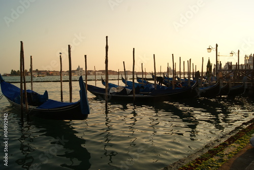 sunset at the pier with a gondola © tania_belova