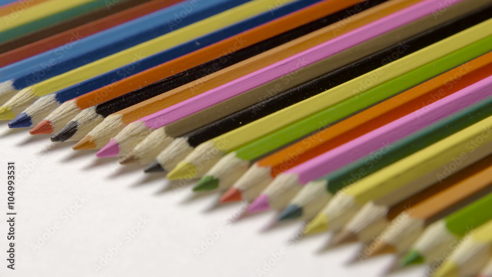 Lin of colour pencils isolated on white background close up Lin of colour pencils isolated on white background close up