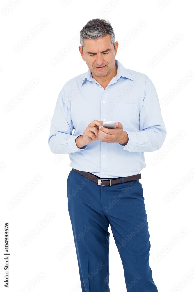 Thoughtful businessman using smartphone Thoughtful businessman using smartphone