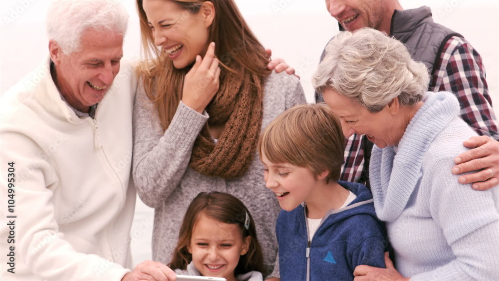 Family standing and laughing Family standing and laughing