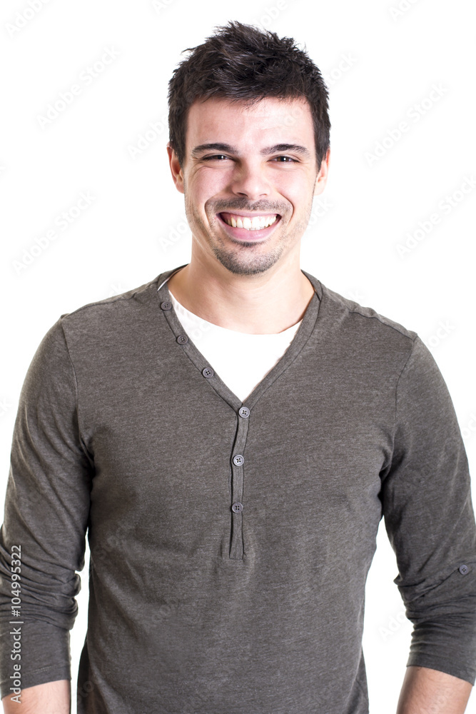 Young man smiling on white background Young man smiling on white background