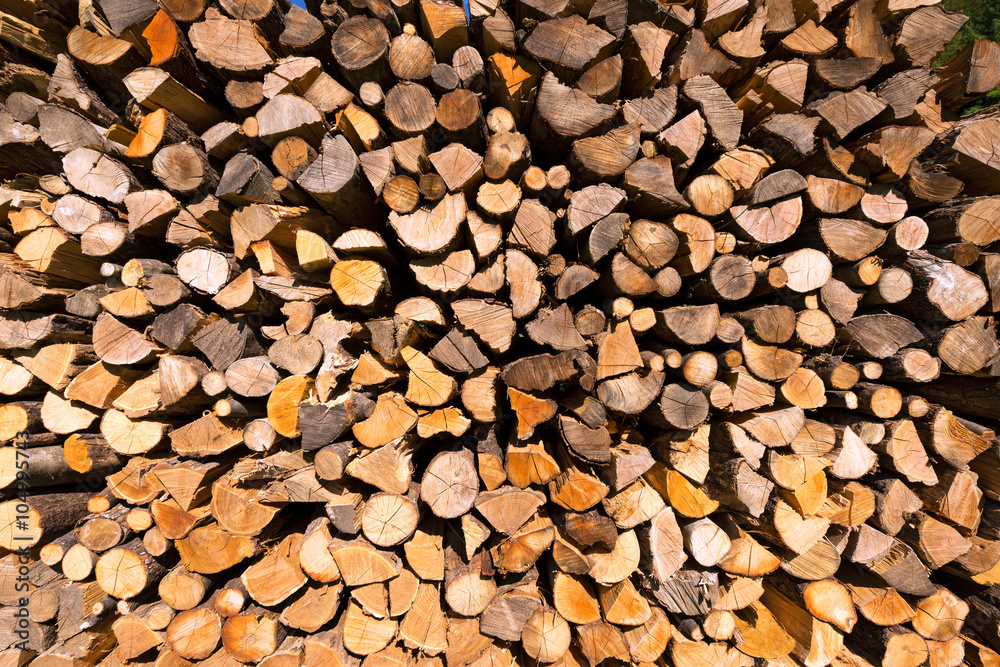 Pile of Chopped Firewood / Background of dry chopped firewood logs in a pile Pile of Chopped Firewood / Background of dry chopped firewood logs in a pile