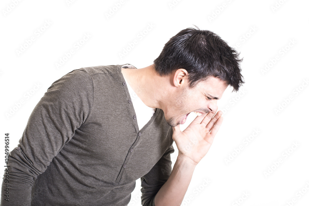 Young man shouting down with hands on the mouth isolated on a wh Young man shouting down with hands on the mouth isolated on a wh