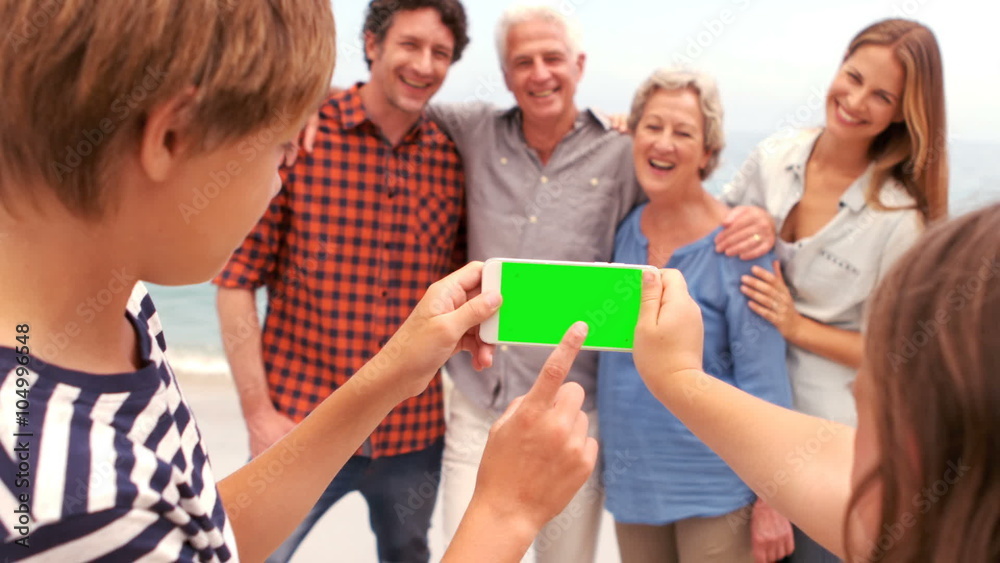 Children taking picture of their family Children taking picture of their family