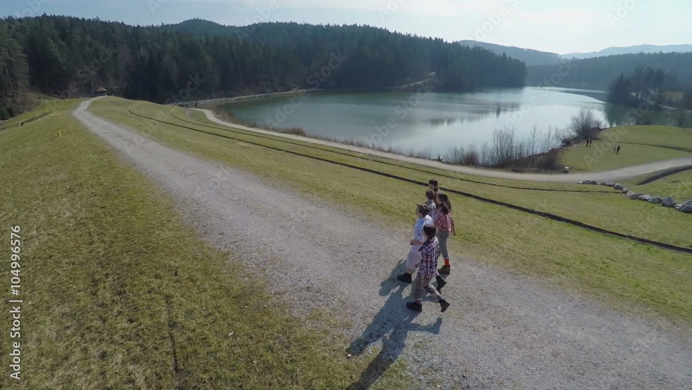 Walking on the path with a beautiful view over the lake Walking on the path with a beautiful view over the lake