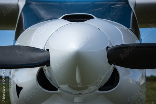 Front view of a small airplane close-up