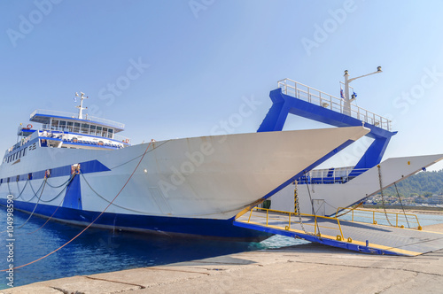 Blue ferryboat for the transport of people and cars © bennian_1