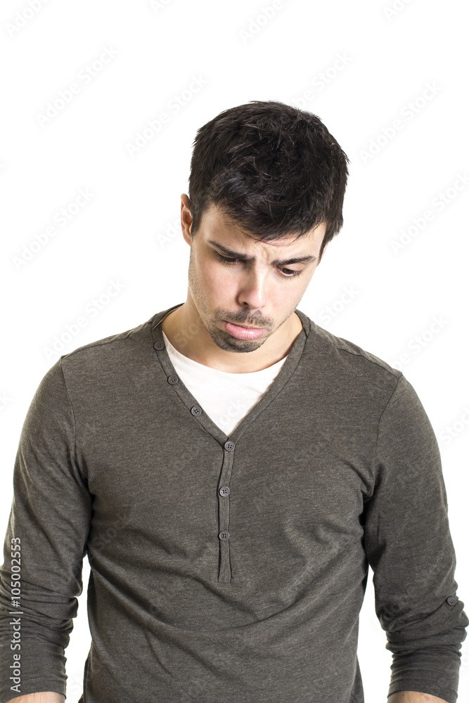 Portrait of young sad man over white background Portrait of young sad man over white background