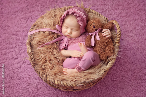 Little newborn girl 11 days, sleeps. Beautiful newborn girl wihh
