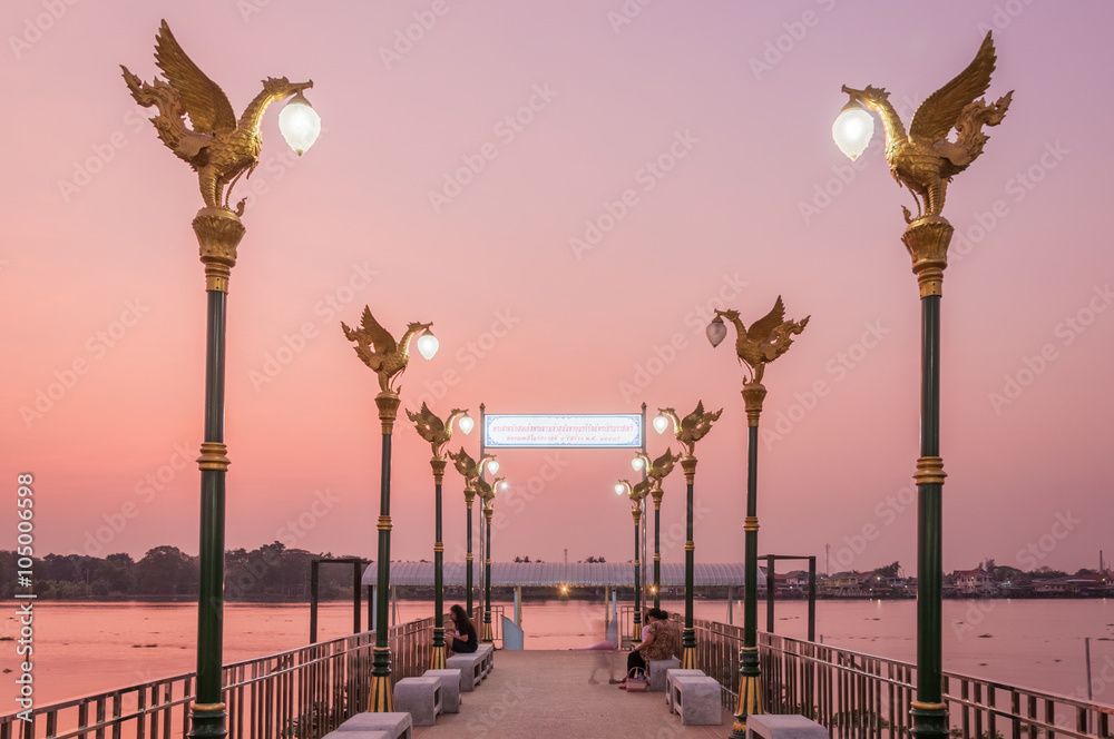river pier decorate with Thai light pole, located by Chaophraya