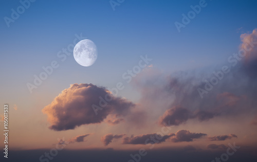 Moon with sunset sky background.