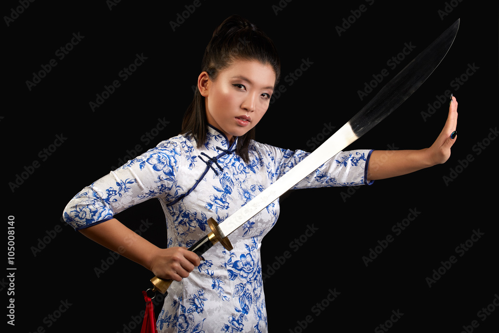 young beautiful Japanese woman looking aggressively at camera an young beautiful Japanese woman looking aggressively at camera an