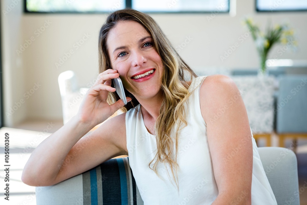 smiling woman making a phone call smiling woman making a phone call